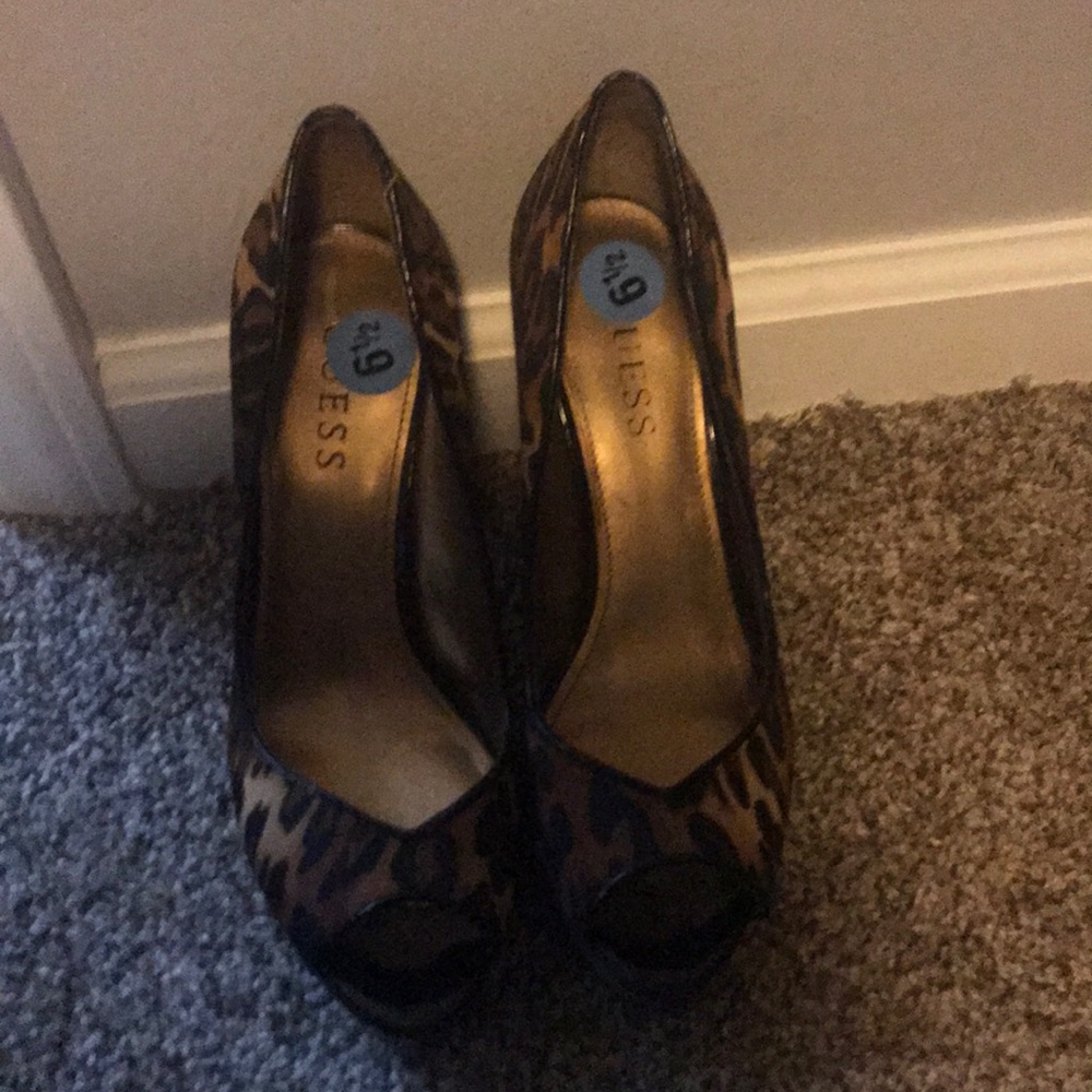 Brand new, with tags, guess leopard print heels.